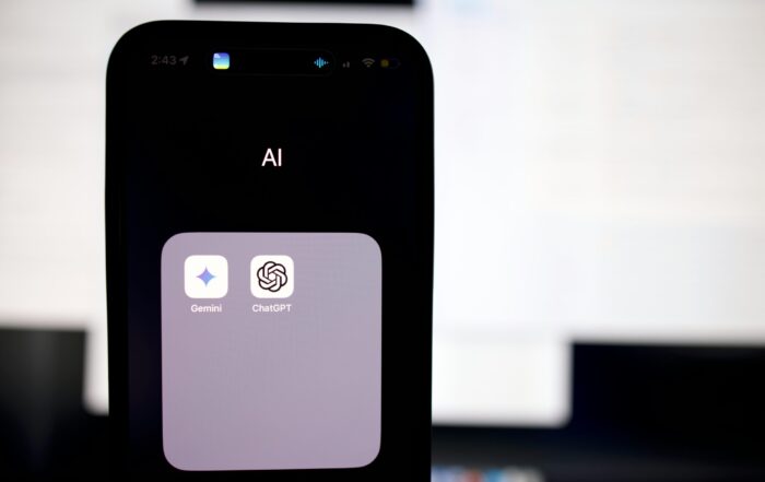 a close up of a cell phone with an ai button